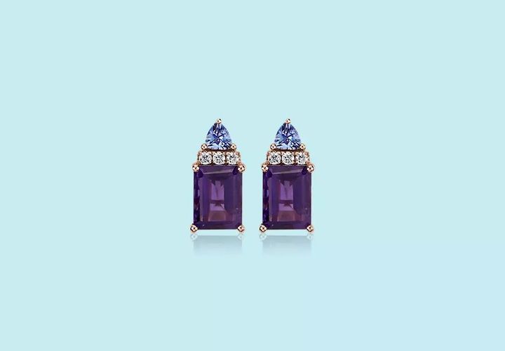 Emerald cut amethyst gemstone earrings accented by tanzanite gemstones
